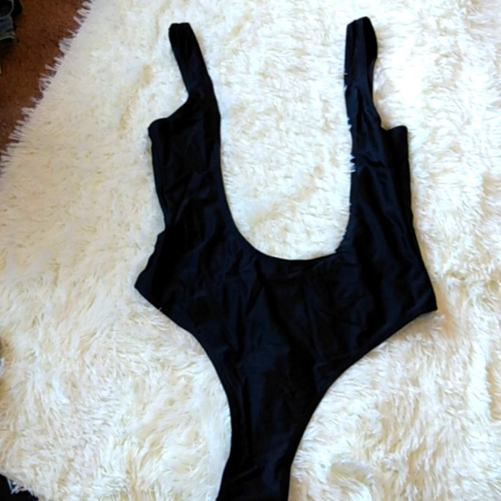 Black strapped thong swimsuit